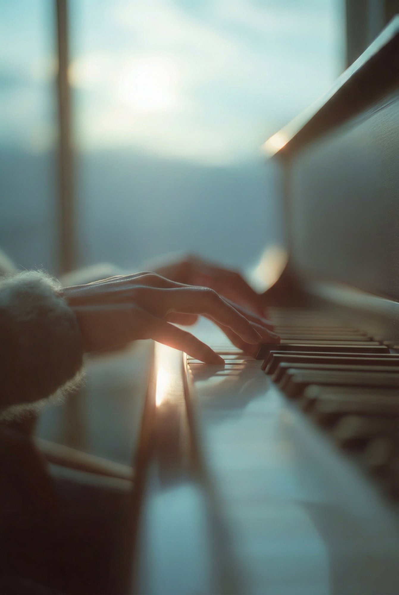 Child's hands on piano keys during an in-home lesson — developing artistry and technique in Marietta, GA